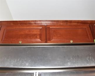 $1,400 to include: cabinets custom built by IXL cabinets, island, counters, sink, faucet