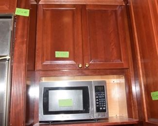 $1,400 to include: cabinets custom built by IXL cabinets, island, counters, sink, faucet