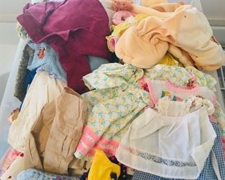 Lots of vintage doll clothes