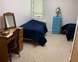 2 other twin size beds/mattresses in great shape. Various dressers, sewing machine cabinet...