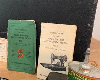 Singer Sewing Machine Portable with Case and original paperwork/oil featherlight