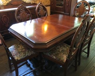 Antique dining table and 6 chairs - includes table pads