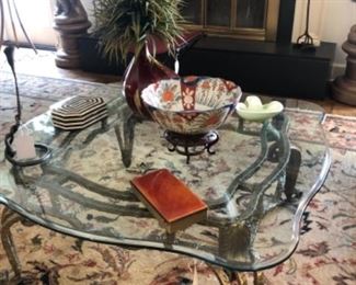 Glass top metal coffee table