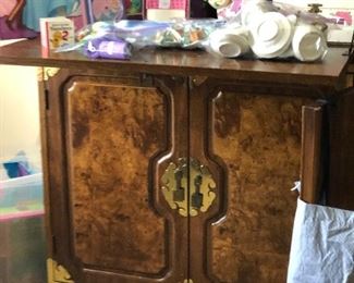 Campaign-style cabinet with brass trim 