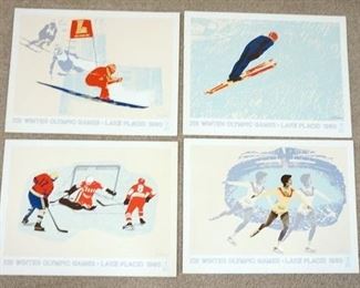 1074	LOT OF FOUR XII WINTER OLYMICS LAKE PLACID 1980 PRINTS. THEY MEASURE 25 IN X 19 IN & HAVE SOME STAINING & SLIGHT CREASING/TEARS AROUND BORDERS. 
