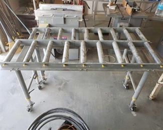 150	

Two Shop Fox Material Rollers
Both are adjustable Heights. Both Measure Approx: 65" x 18"