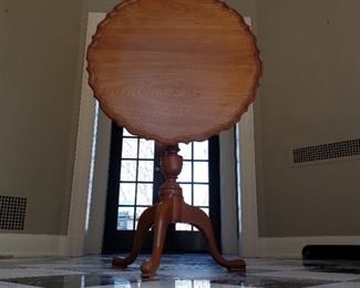 Table top is 25" in diameter. Table is 42" in height when upright as shown. Table height is 28" when flat.