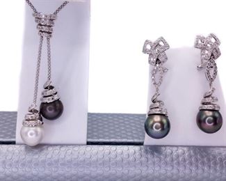 A pearl necklace custom made for an elegant evening. To have both a White Pearl of this size AND a Tahitian Pearl the same size with 0.70 carats of dazzling diamonds is nearly unimaginable. Nearly. Yet, this necklace is created and set in beautiful 18k White Gold. CHAIN INCLUDED (This necklace is meant to match Lot 11). The set is shown in the first two photos, in this lot you are bidding solely on the necklace.