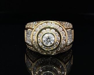 Heavy, XL premium men's ring exquisitely crafted in 25+ grams of 18k yellow gold and featuring many round and princess cut diamonds totaling approximately 5.00 carats in total! Lots of bling and championship glint in this extraordinary ring! A true statement ring for the man who has earned it.