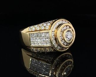 Heavy, XL premium men's ring exquisitely crafted in 25+ grams of 18k yellow gold and featuring many round and princess cut diamonds totaling approximately 5.00 carats in total! Lots of bling and championship glint in this extraordinary ring! A true statement ring for the man who has earned it.