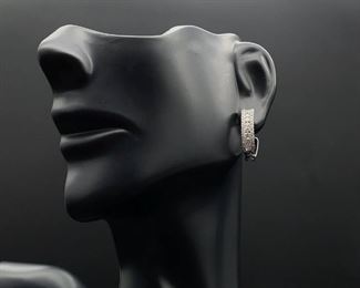 Brand new, never worn!! 0.62 carat very fine VVS - VS Diamonds on oval hinged hoop earrings in 14k white.