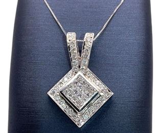 Put some bling in your Spring! Nearly 3.00 carats of fine goods! 16 invisible set princess cut Diamonds set in a 18k white gold, outlined again by Diamonds and double looped clasp. Chain is not included.