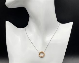 Tacori. Sparkling high grade Diamonds accentuate spectacular crescent details on a super versatile 18k Rose Gold halo necklace. The fantastic 18k White Gold chain with Tacori charm is included.