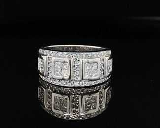 This amazing 1.50 carat beautifully designed ring is well made in heavy 5.27 gram 14k white gold. Very fine goods! The diamonds are VS-SI / G-I. This masterful ring is meant to match the earrings in the next photo.