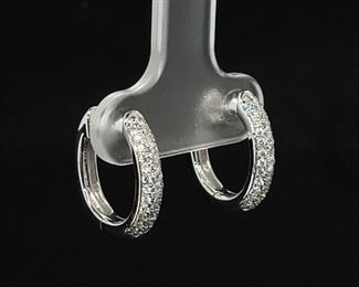 Brand new, never worn!! 0.62 carat very fine VVS - VS Diamonds on oval hinged hoop earrings in 14k white.