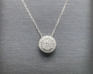 Circular layers hold almost perfect VS diamonds in this 14k White Gold 18" Necklace. The burst of light and energy that this diamond cluster holds is really very beautiful.