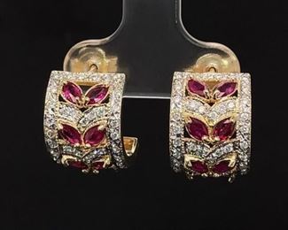 Very special 1.00 ctw. of Marquise cut Red Rubies thoughtfully arranged with amazing 1.00 ctw. round diamonds all embedded in 14k sparkling Yellow Gold. Beauty has been made.