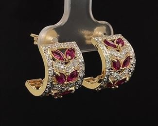 Very special 1.00 ctw. of Marquise cut Red Rubies thoughtfully arranged with amazing 1.00 ctw. round diamonds all embedded in 14k sparkling Yellow Gold. Beauty has been made.