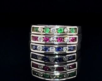 Remarkable Four Tier Blue, Green, Red, and White Gemstone Estate Ring in Sterling Silver; the red and blue gems are possibly Spinel.