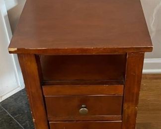 $25.00.................End Table, shows some wear 24" x 14", 24" tall (C147)