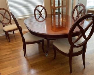 HALF OFF! $600.00 NOW, WAS $1,200.00.......Thomasville Table and 5 Chairs, measures 53" x 53", one 24" leaf , has a few small wear spots on top table, chairs could use recovering, was $3,600.00 new (C152)F