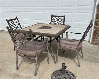 $100.00...................Sturdy Patio Table, 4 Chairs and Umbrella Stand (C001)