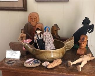 Assortment J Cook carvings 