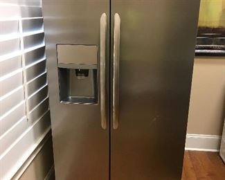 GE side by side refrigerator freezer, stainless steel, like new never used 