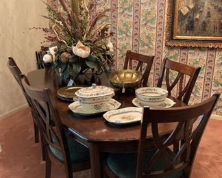 Lovely dining table - - - has leaf and a total of 8 chairs