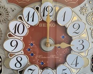 "Melodies in Motion" clock