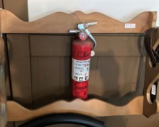 Gun rack; fire extinguisher 