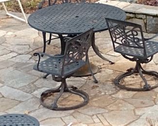 Vintage black metal patio furniture.