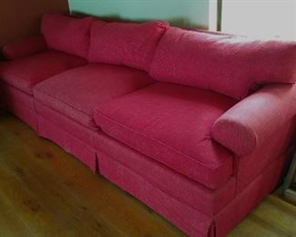 Beautiful cherry red sofa.