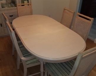 Nice faux bamboo dining room table and six chairs. Matching china cabinet too. 