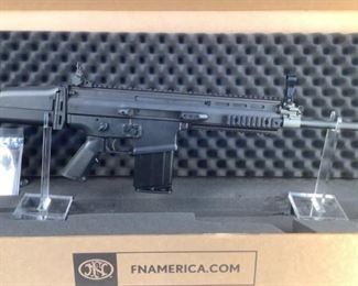 Serial - H0C21439
Mfg - FN SCAR
Model - 17S
Caliber - 7.62x51 NATO
Barrel - 16.25"
Capacity - 20+1
Magazines - 1
Type - Rifle, Semi Automatic
Located in Chattanooga, TN
Condition - 1 - New
The SCAR 17S is the commercial version of the battle rifle chosen by the United States Special Operations Command, and for a good reason. This piston ran battle rifle was designed from the ground up with reliability and maneuverability in mind. Weighing in at 8 pounds, this rifle is perfect for those who need an extremely highly regarded battle rifle for hunting or preparedness reasons. Out of the box you will get the rifle, one 20 round magazine, folding iron sights, and the PWS muzzle brake (which does an excellent job at recoil management). Since this rifle is piston driven, the user has full ability to fold the stock, adjust length of pull, and features an adjustable comb for use with optics. This rifle is Black in color and comes with all of the factory FN accessories.