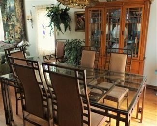 9 piece set - Robert Sonneman's Urban Primitive . 
 A Golden oak wood dining hutch, mirrored with glass shelves and bottom cabinet with a gorgeous geometric bronzed metal with a  glass table top.  Sold as set only.  Heavy, bring lots of help!  