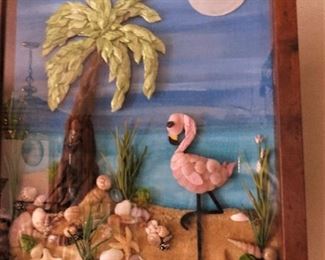 Seashell art Flamingo and palm tree on shell strewn sand.  Glass covered Shadow box wall art
