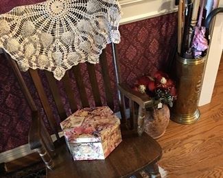 Rocking chair, brass umbrella stand, canes