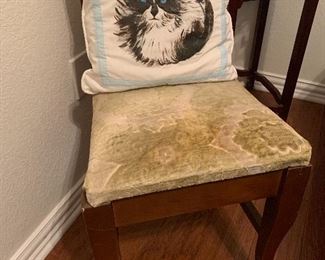 Crushed velvet side chair with cat pillow