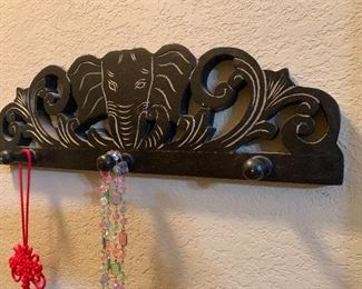 Carved elephant coat rack