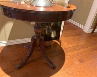 Antique round pedestal table with drawers