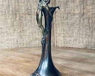 ART NOUVEAU BRONZE LILY VASE | tapering form decorated with leaves and a protruding female figure, the mouth shaped as a lilly; h. 12-1/4 in. 