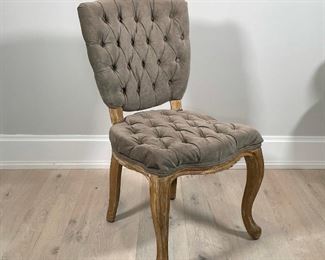 ARHAUS TUFTED VELVET CHAIR | light colored wood with tufted velvet seat and back; 38 x 21 x 24 in.; some of the seat cushion has slid into the frame, probably could be repositioned 