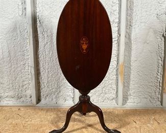 INLAID OVAL TOP TEA TABLE | 19th century or earlier, carved with ball-and-claw feet; h. 27-1/2 x 28 x 15-1/2 in. 