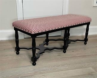 UPHOLSTERED WINDOW BENCH | having an upholstered top with chrome tacks, black painted carved and turned wooden frame; h 19 x 45 x 18 in. 