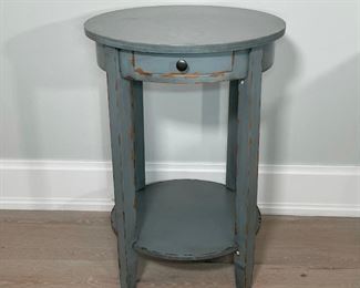 BLUE PAINTED ROUND SIDE TABLE | single drawer with a round lower shelf; h. 28-1/2 x dia. 20 in. 