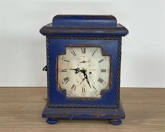 BLUE PAINTED CLOCK | with a printed face, blue antiqued paint; h. 11 in. 