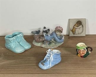 COLLECTION DECORATIVE PORCELAINS | including a lladro boy figurine, baby shoes, a plaque, etc. 