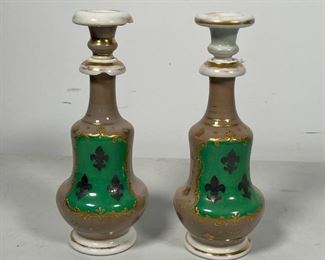 PAIR PAINTED PORCELAIN BOTTLES | fleur-de-lis decoration and stoppers; h. 8 in. 