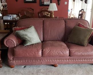 Three cushion brown leather sofa
